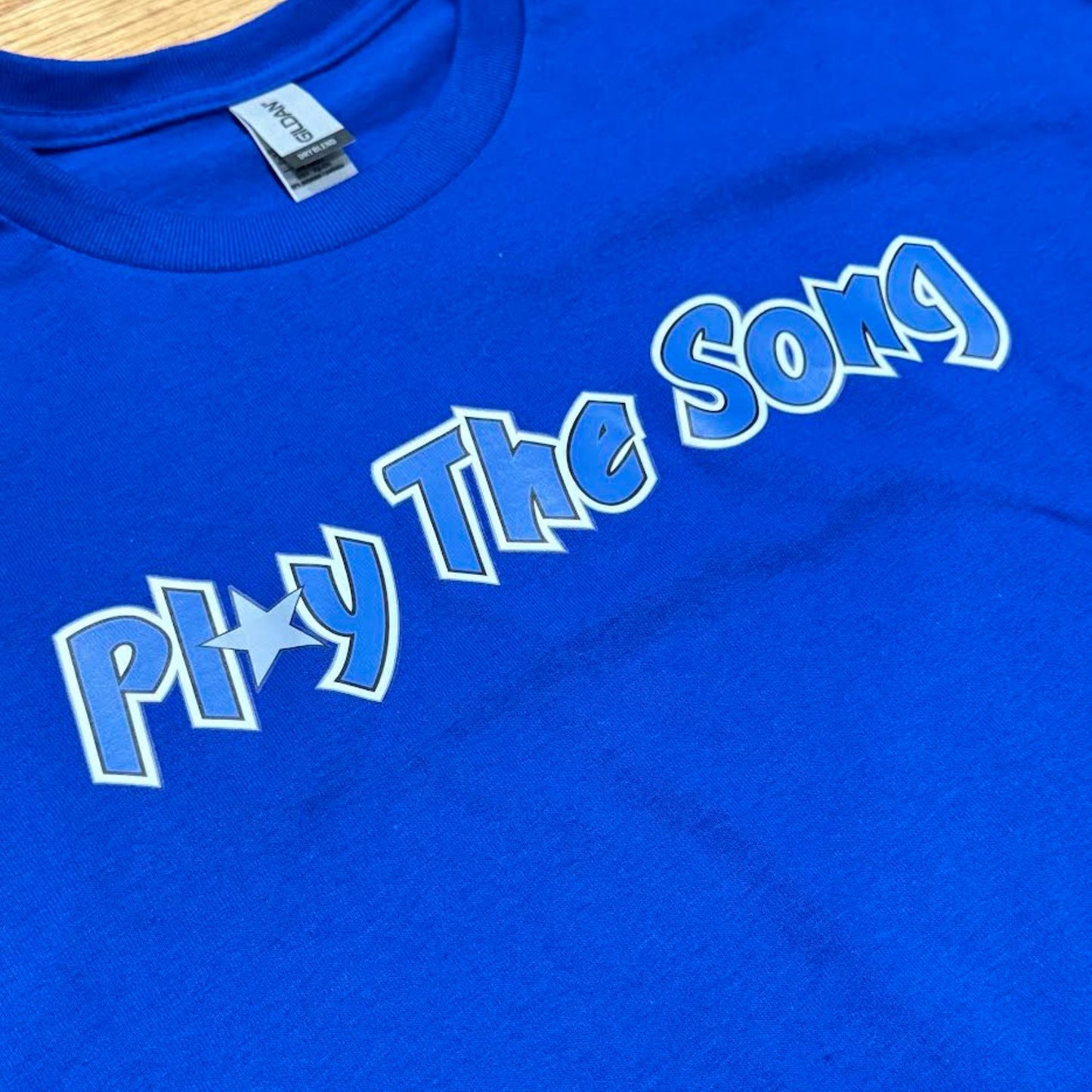 PLAY THE SONG TEE  - BLUE